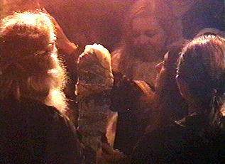 sw98images1/cavepeople-stang.jpg, 19K